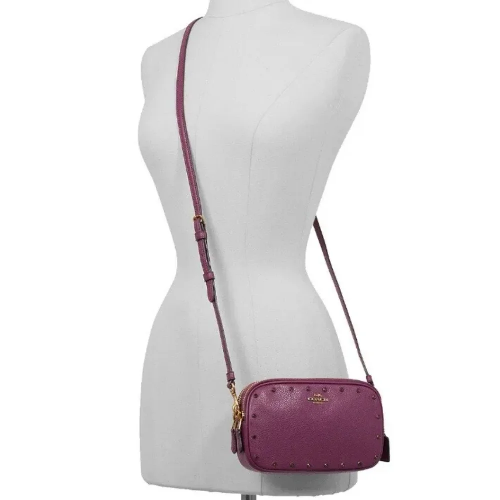 NWT Coach Cristal Border Rivets Dark Berry Crossbody / Clutch in Pebble …